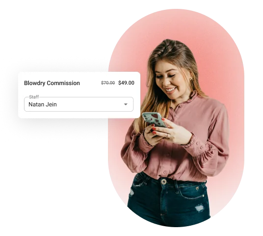 Photo of a woman checking her phone, with a 'Blowdry Commission' card overlay showing a discounted price of $49.00 from $70.00 and staff member 'Natan Jein'